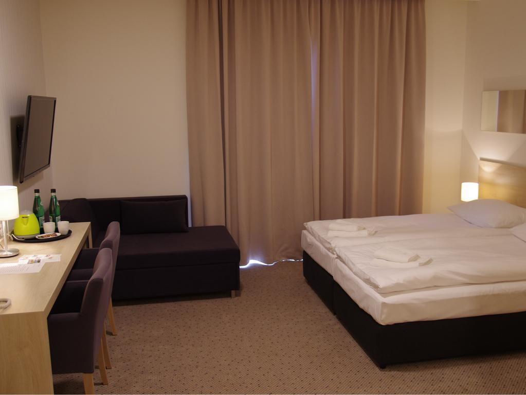 Hotel Uniejów Uniejow Quarto foto